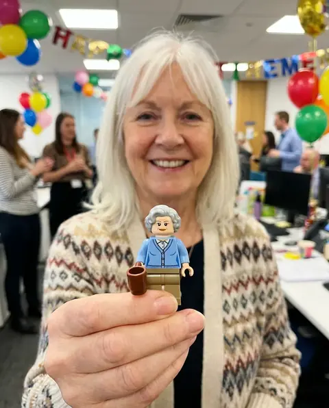 Concept render: retiree with a minifigure of themselves